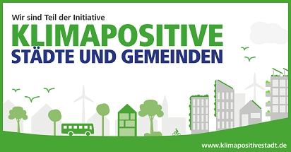 Poster mit der Aufschrift "Klimapositive Stadt".&nbsp;&copy;&nbsp;Initiative Klimapositive Städte und Gemeinden